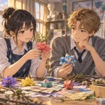 美術室で交換留学生と手作り装飾を組み立てるアートスモック姿の相沢澪